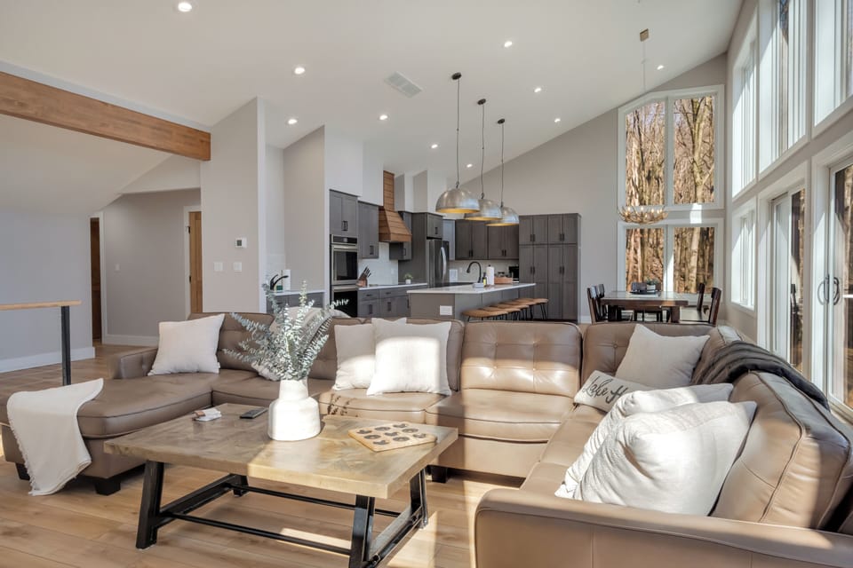 Huge open-concept living room, kitchen & dining space to gather w/ loved ones