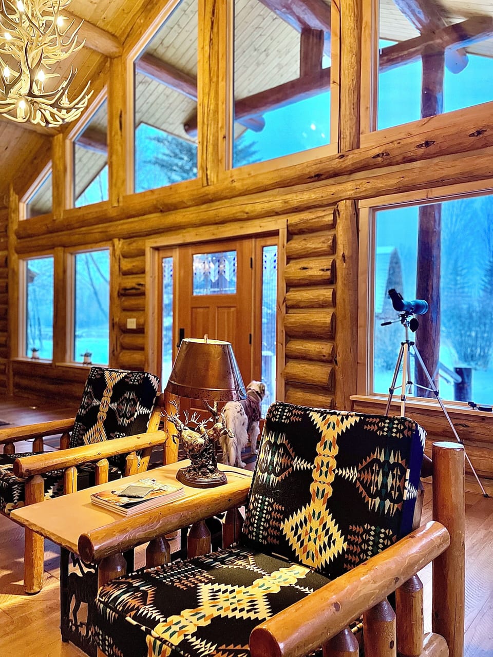 Lodge Room with door to front porch featuring Teton Views