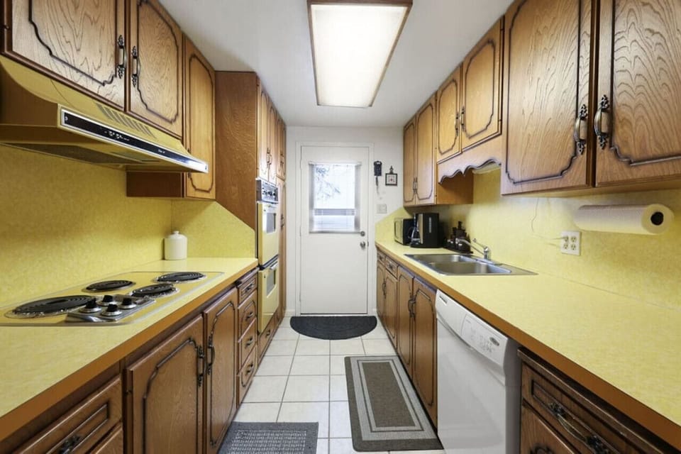 Galley kitchen, fully stocked