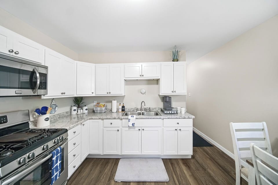 Kitchen sink and view of hallway 