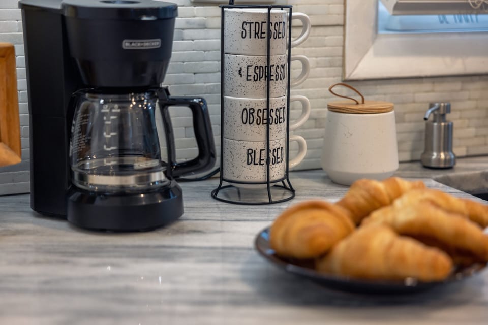 Kickstart your day with a fresh coffee at this cozy setup.