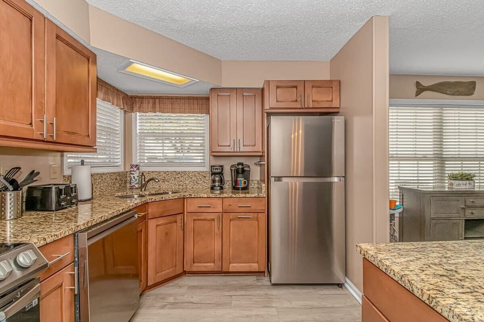 Modern convenience meets classic comfort: Indulge in the luxury of new stainless steel appliances.