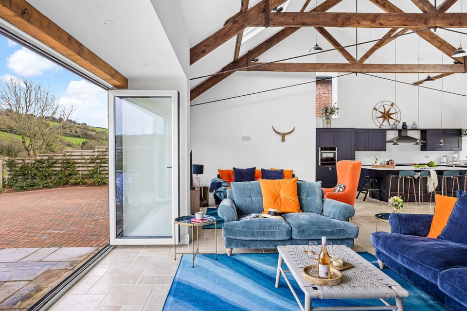 Living area with comfortable seating - The Shippon