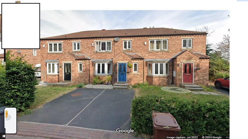 2 parking spaces at the front of the house