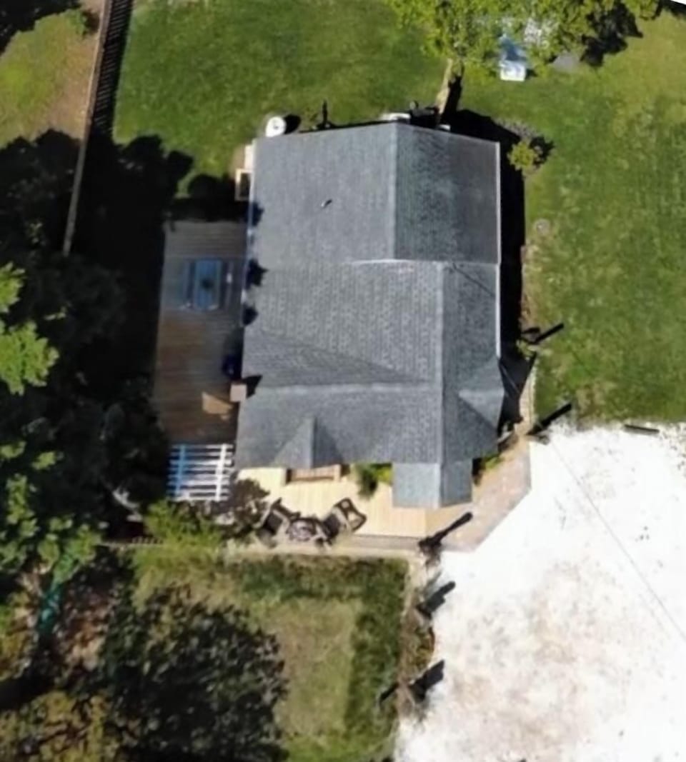 Cottage Bluefish is a single family home with fenced backyard & wrap-around deck