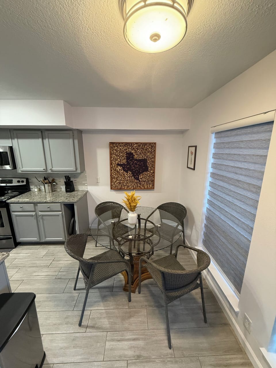 Hand-made Texas themed bulletin board in the kitchen. 