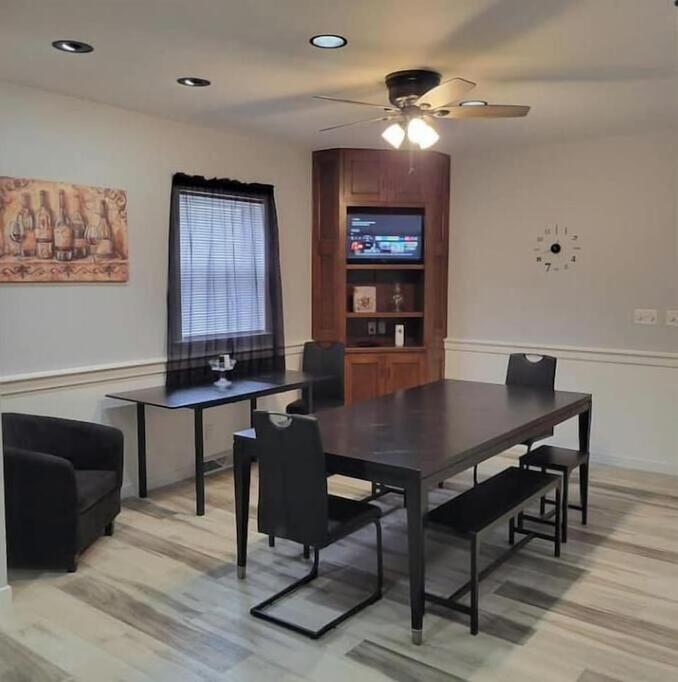 Large 8 Seating Table. Smaller support Table. 32 Inch Amazon Fire Tv. 