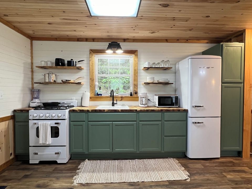Thoughtfully-stocked kitchen with new appliances
