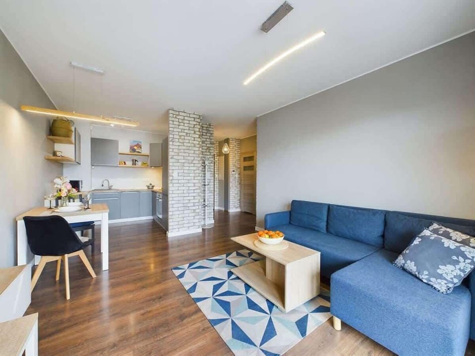 Living room with dining table and chairs.