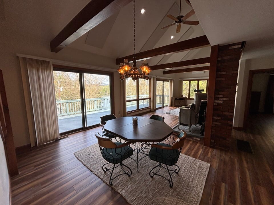 Formal Dining with Large windows and sliders to enjoy the views