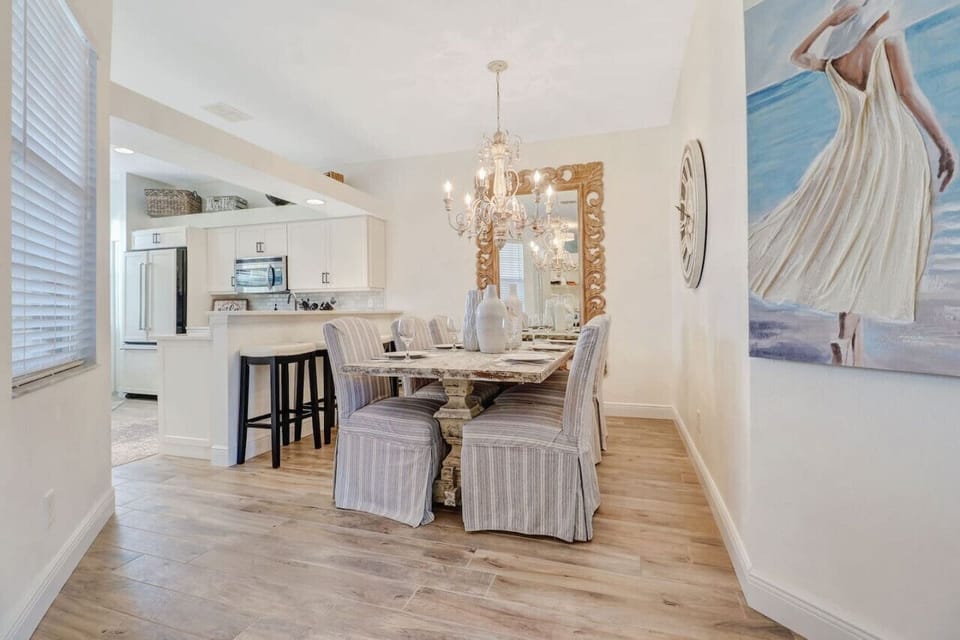 Open plan kitchen,  with breakfast bar and dining area.