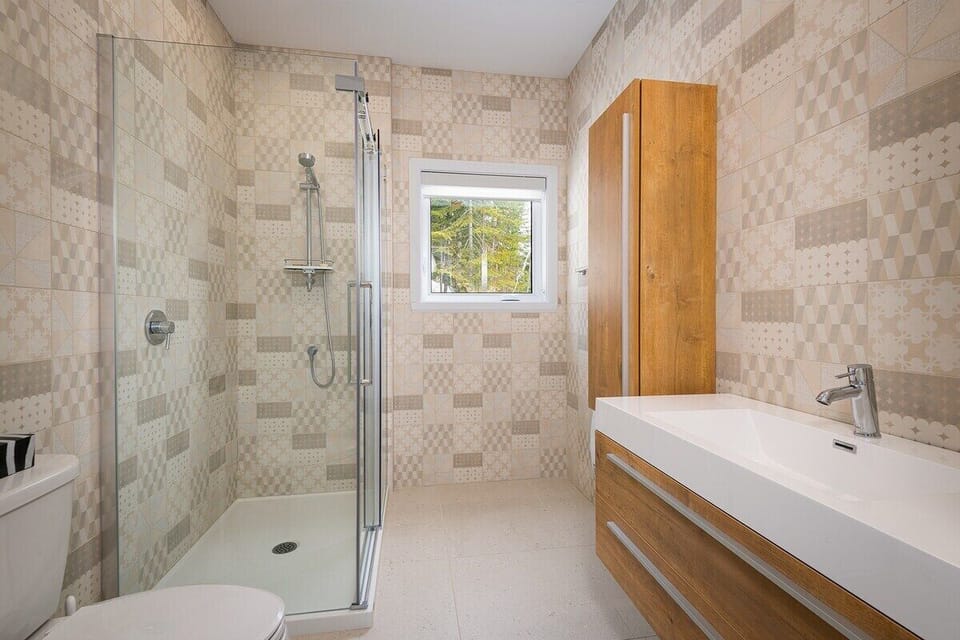 Refresh in style with a shower and view to match.