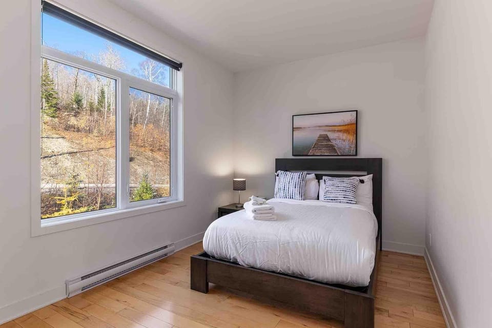 Wake up to bright skies and beautiful views right from your bed.