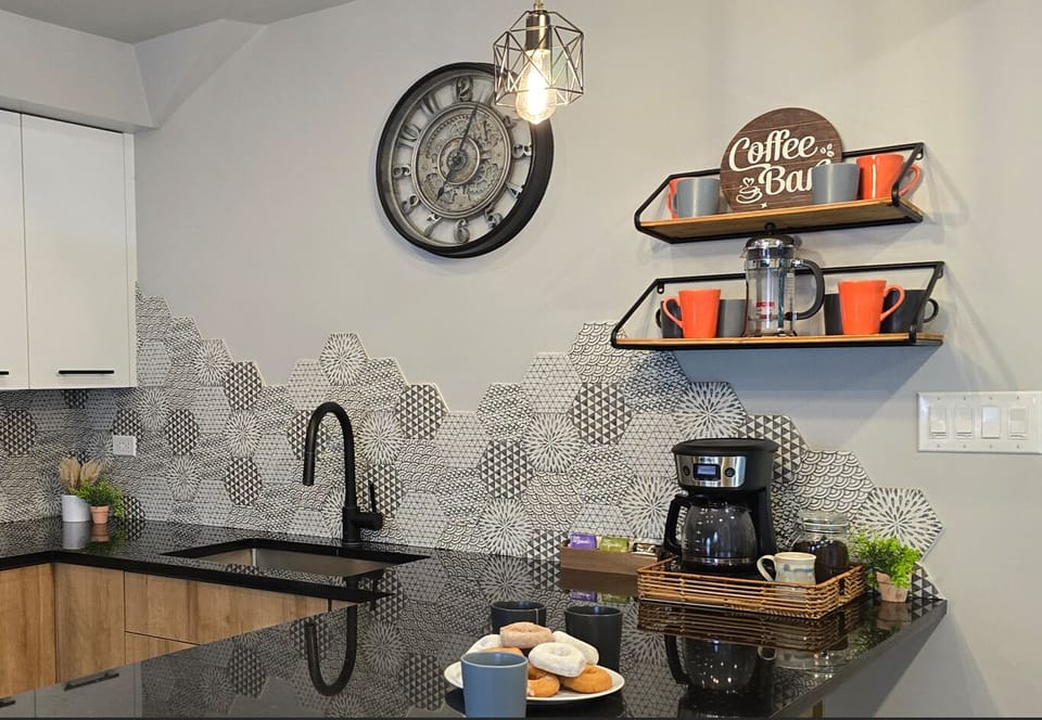 Kickstart your day with a cup of coffee or tea! The cabin has a French press and drip coffee machine, along with complimentary coffee, tea, and sweeteners