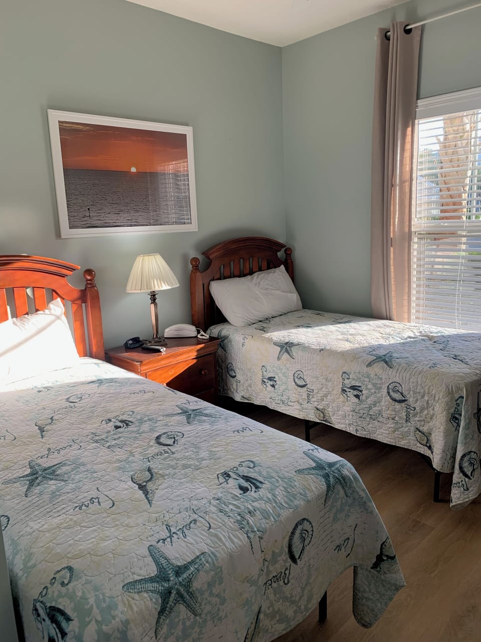 Two twin size beds, smart TV, closet, dresser, just outside door hall bathroom