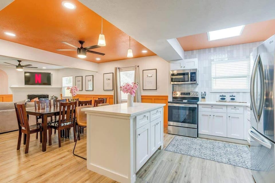 Enjoy meals & memories around the dining table, just steps from the sleek, modern kitchen. Whether you're preparing a big family feast or enjoying a casual snack, this space offers the perfect balance of style & functionality for everyone to gather.