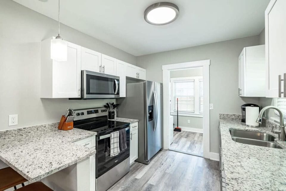 Start your mornings with coffee and end your evenings with home-cooked meals in this modern kitchen.