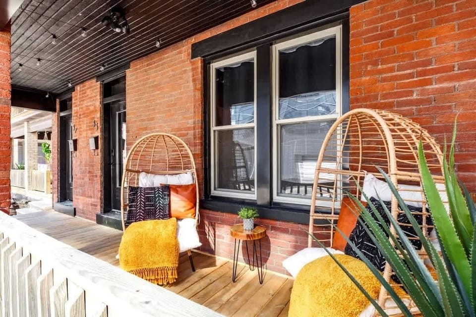 Enjoy a peaceful moment on this private balcony, offering stunning views and a perfect spot for relaxation in the heart of Columbus.