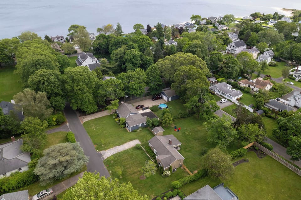 Aerial view of the neighborhood and Peconic Bay