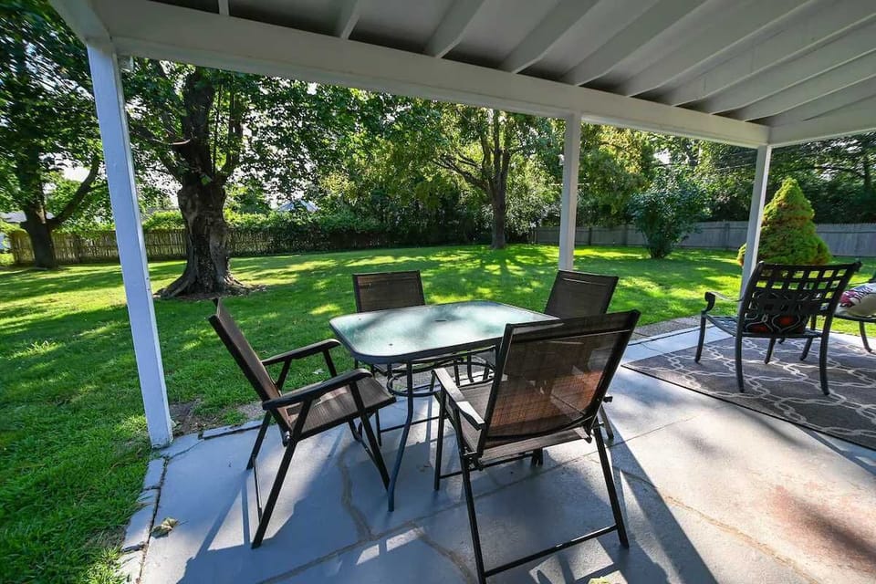 Covered patio with dining for eight