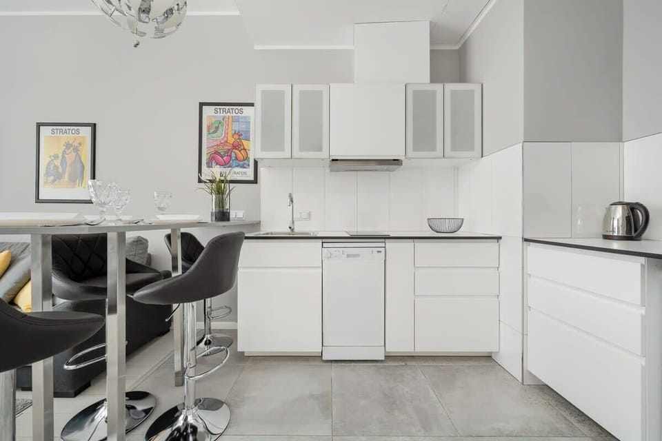 Kitchenette with coffee machine.