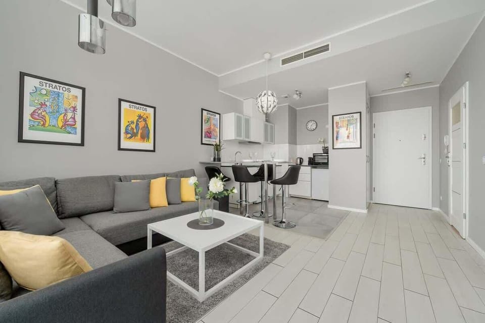 Living room with dining table and chairs.