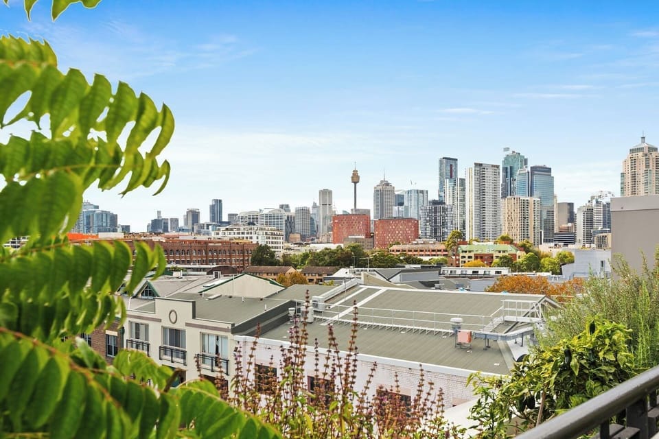 The shared rooftop area has sweeping city views with spots to enjoy them undercover protected from rain or strong sun. 

