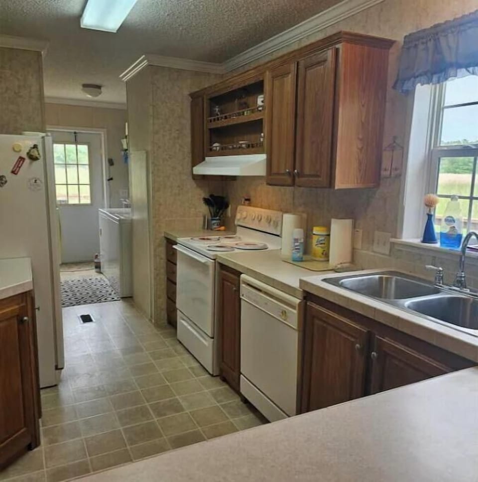 Laundry room is by the side door.