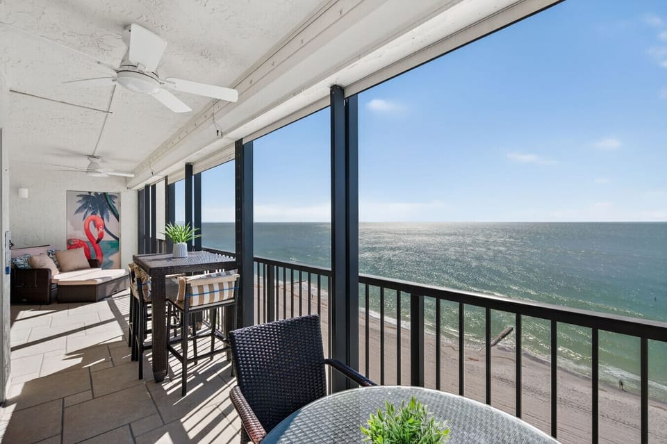 Private balcony w/ ocean views, perfect for morning coffee or sunset drinks.