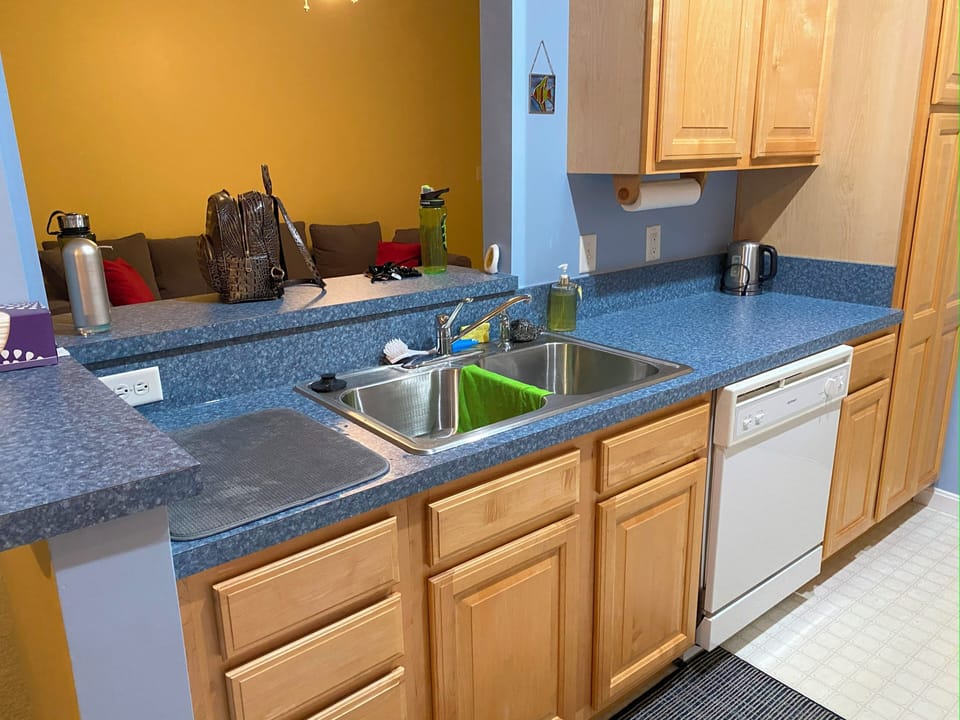 walk through kitchen, fully equipped for quick meal prep