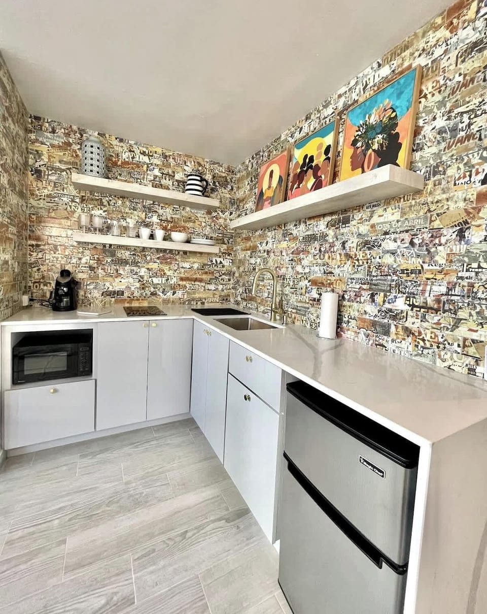 The kitchen is designed to provide the ideal space for preparing your meals during your stay.
