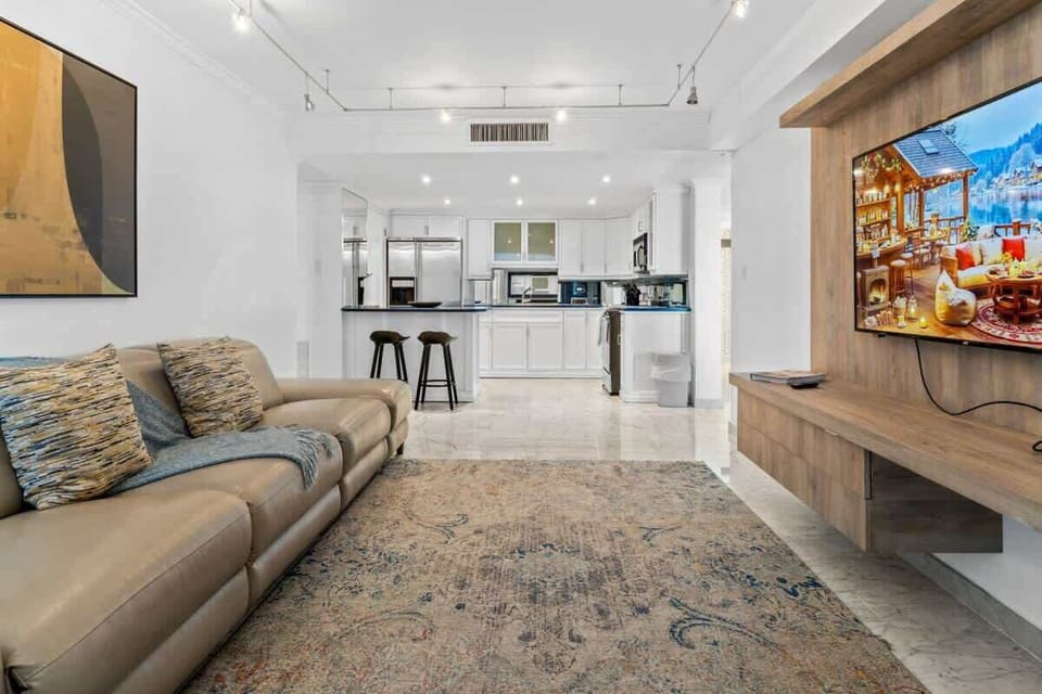 This cozy area is not only suitable for watching television or movies but also provides a welcoming atmosphere where family members can engage in conversations, play games, or simply unwind after a long day.