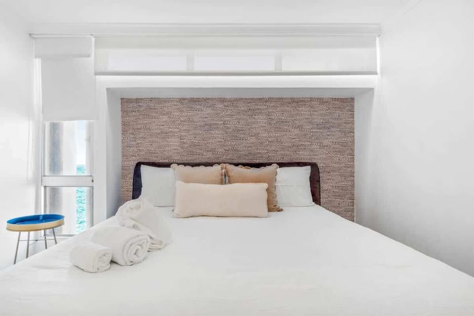 This luxurious bed is designed to offer maximum comfort, featuring a plush mattress and high-quality linens that ensure a cozy and inviting atmosphere.