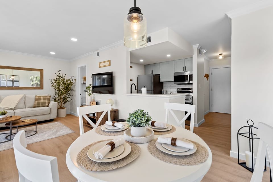 Enjoy meals together in the dining area at the heart of the condo.