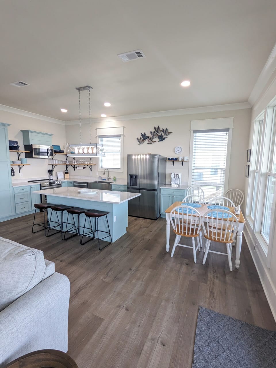 Kitchen Island with seating for 4.  Kitchen table seats 4, expandable to 6.