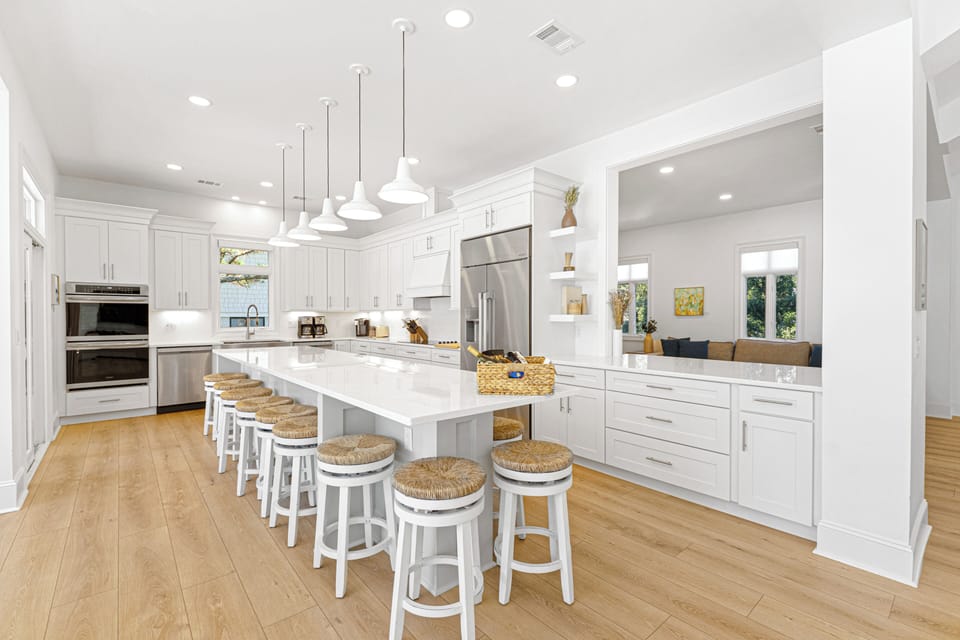 This exquisite beachfront home offers private beach access, breathtaking views, a heated pool & spa, and a chef's kitchen.