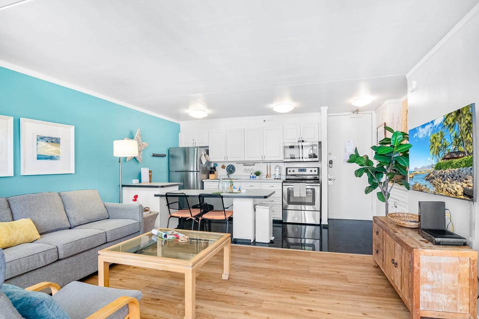 Enjoy watching movies in your living area with a flat-screen TV, pull-out sleeper sofa, armchairs, and a coffee table.