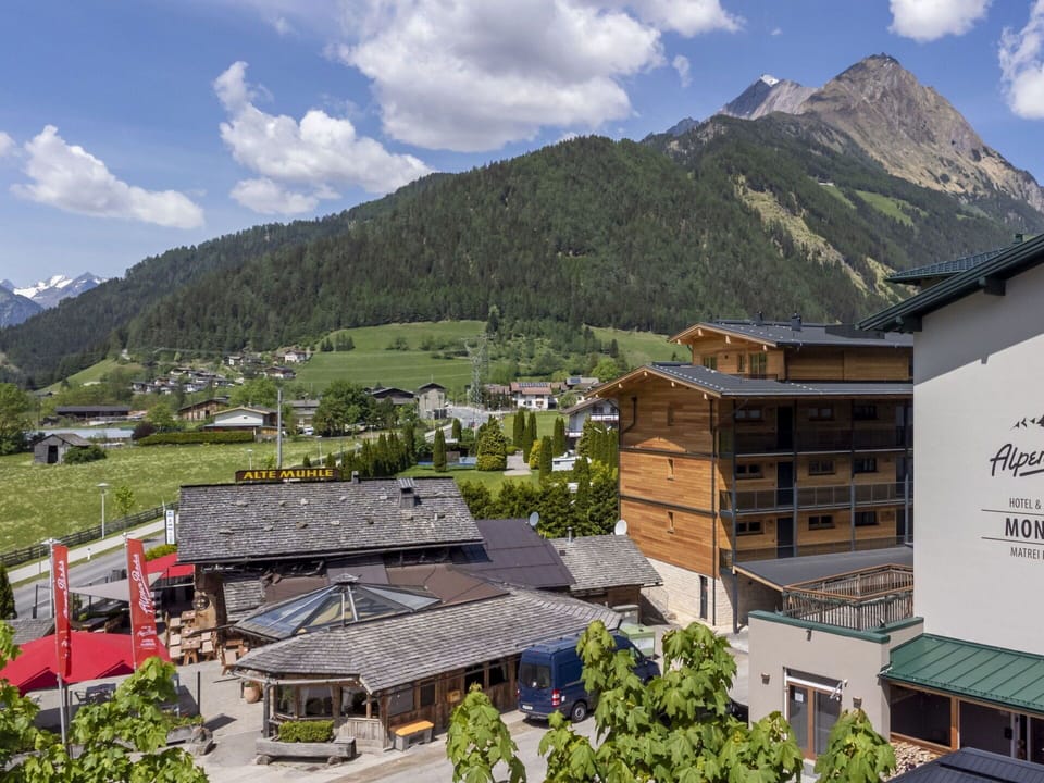 Sky, Cloud, Mountain, Building, Property, Nature, Window, House, Tree, Highland