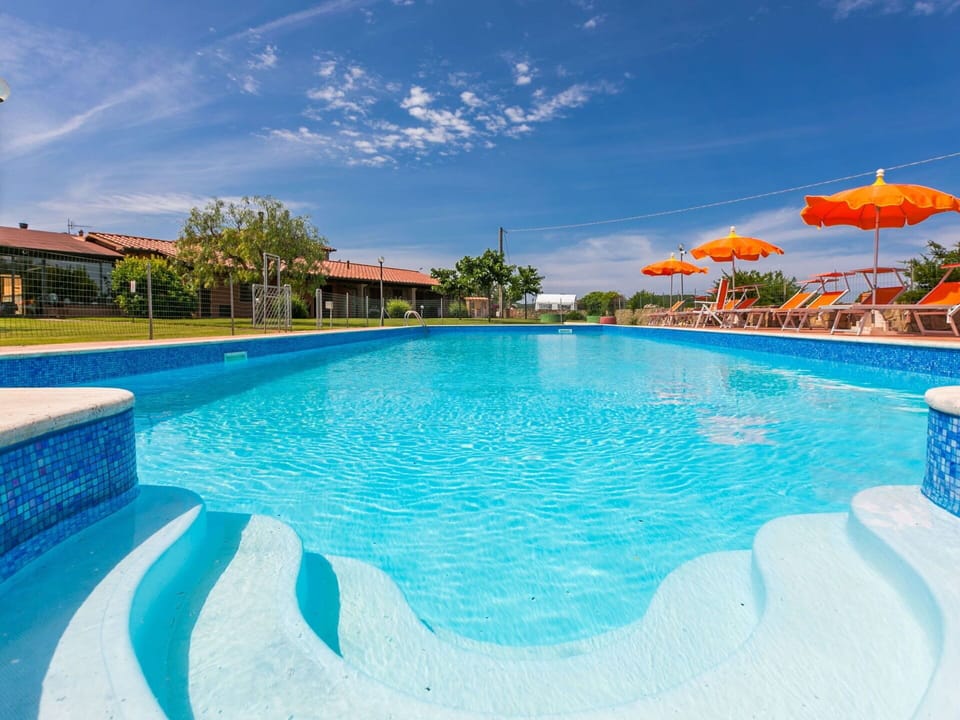 Water, Cloud, Sky, Plant, Swimming Pool, Blue, Tree, Outdoor Furniture, Sunlounger, Aqua