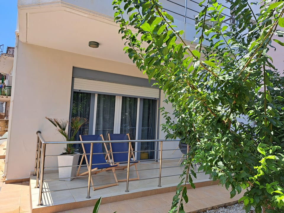 Front Balcony with sunbeds and small table