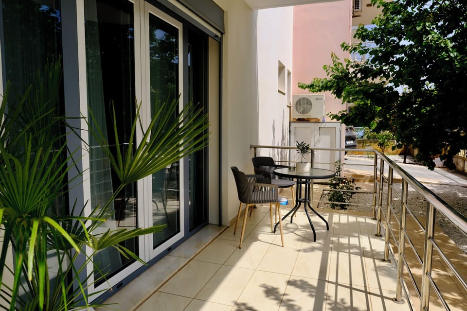Front Balcony with sunbeds and small table