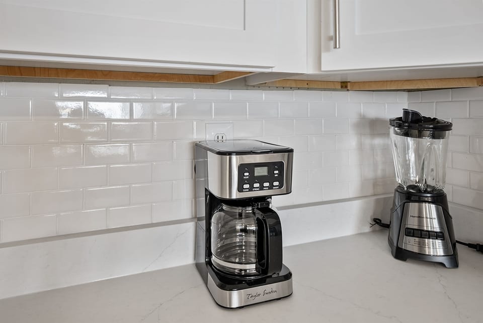 Start your mornings right with premium coffee maker and blender ready for your perfect breakfast blend.
