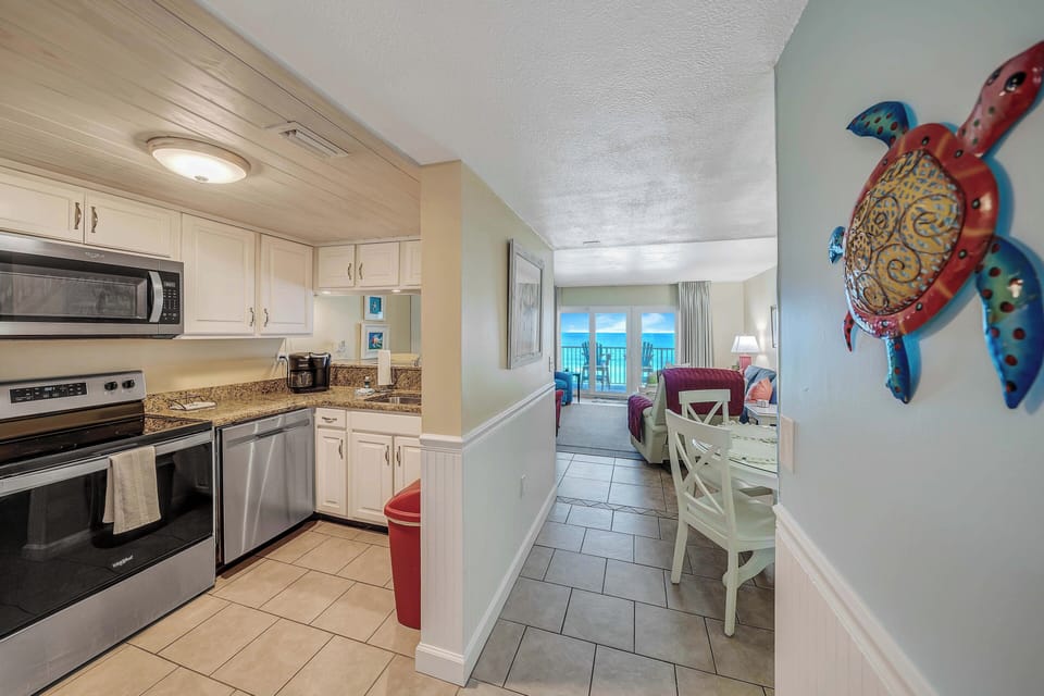 The fully equipped kitchen features granite countertops and stainless-steel appliances and has everything you need to prepare meals for family & friends.