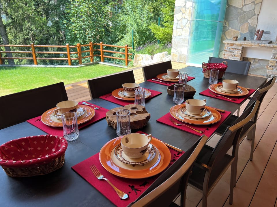 Covered terrace set up for breakfast