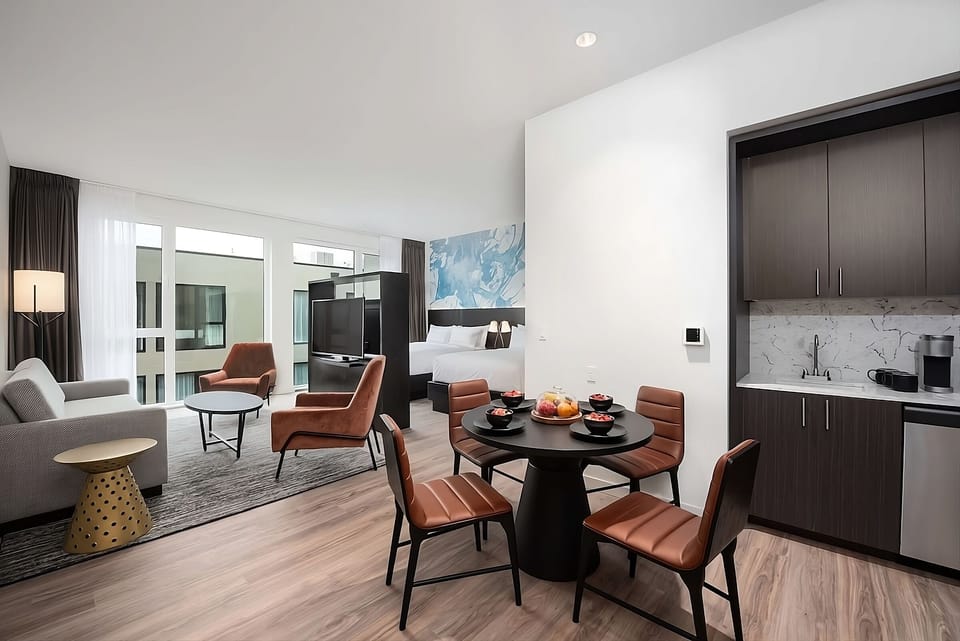 Lounge together in an airy suite made for relaxing evenings.