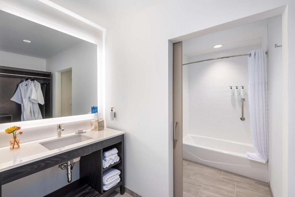 Refresh in a bright bath with spa-like vanity lighting.