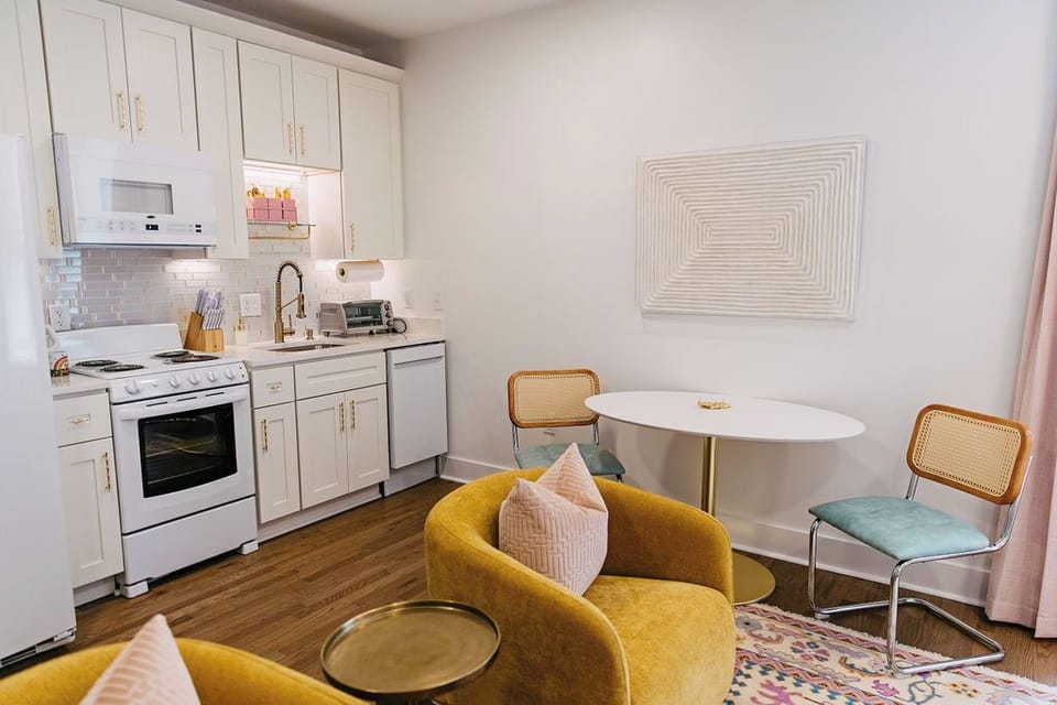 Eat in kitchen with fridge, microwave, oven, range, dishwasher, & toaster oven.