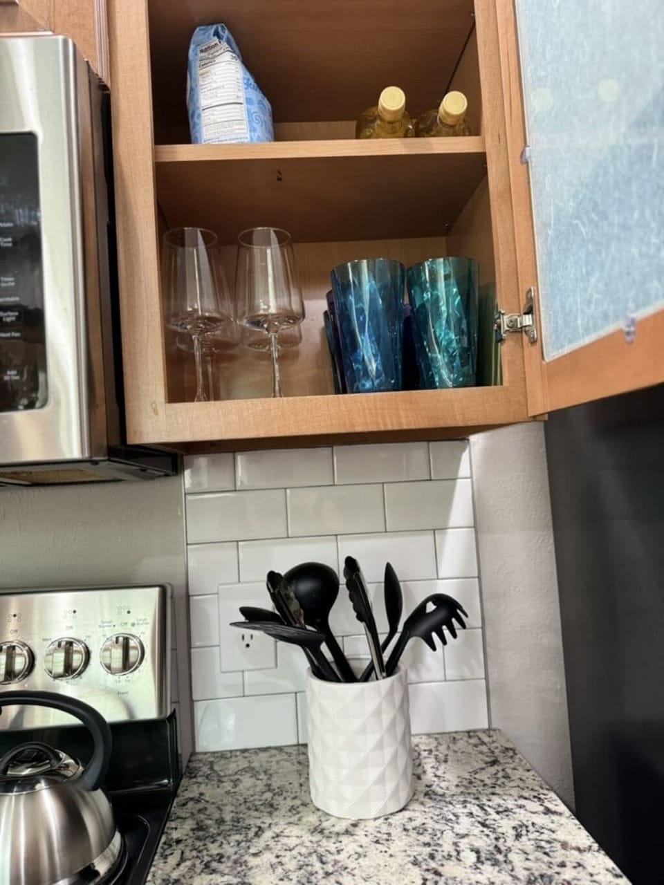 Kitchen complete with cookware and hot water kettle