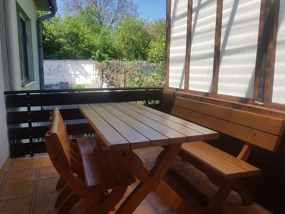 Balcony incorporated into one of the rooms with garden views