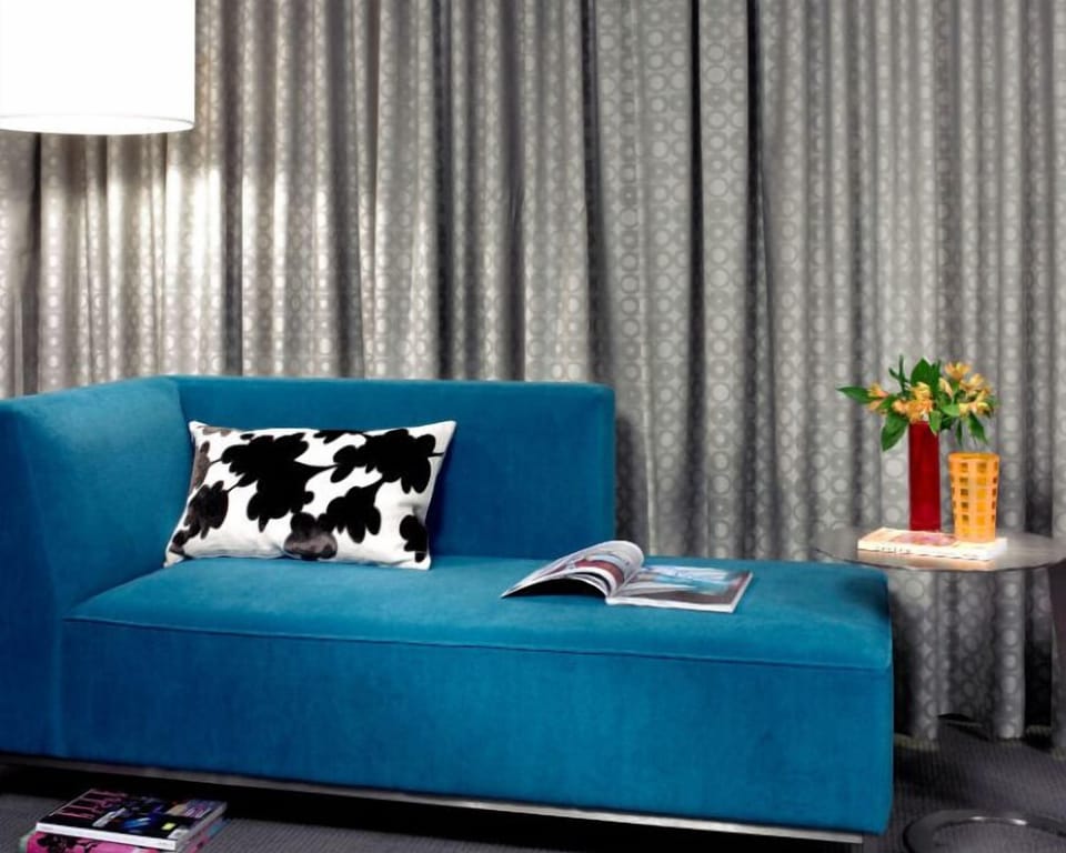 Stylish lounge area with a striking sofa and modern decor, providing a vibrant space to relax or entertain.
